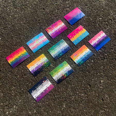 holographic stickers featuring several different pride flags