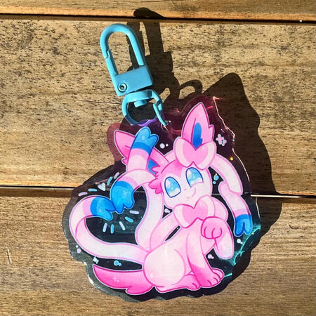 acrylic charm featuring sylveon, the evolution of eevee from pokemon